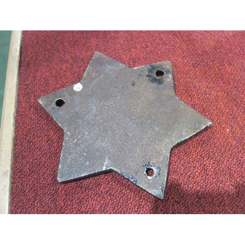 7101 - A cast iron LNER-E star tank wagon plate, Sept 1933