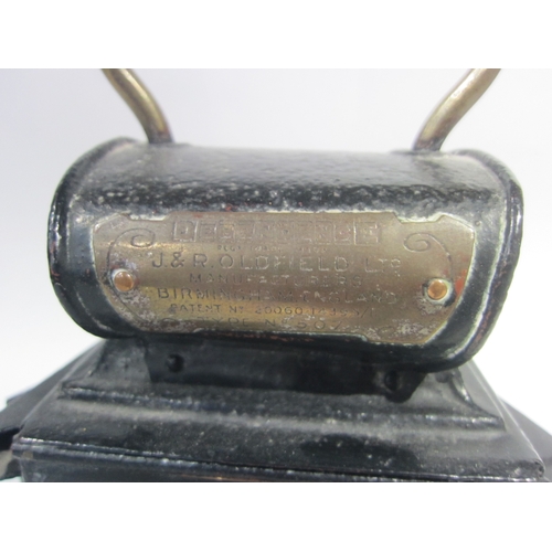 7114 - A metal and brass J&R Oldfield Ltd three aspect lantern