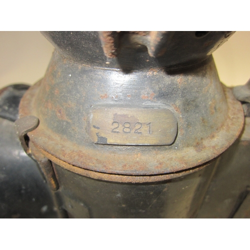 7118 - An SR three aspect hand lamp with internal reservoir and burner, brass plaque numbered 2821