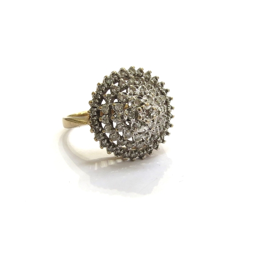 7297 - A 9ct gold diamond domed cluster cocktail ring. Size N, 4.4g