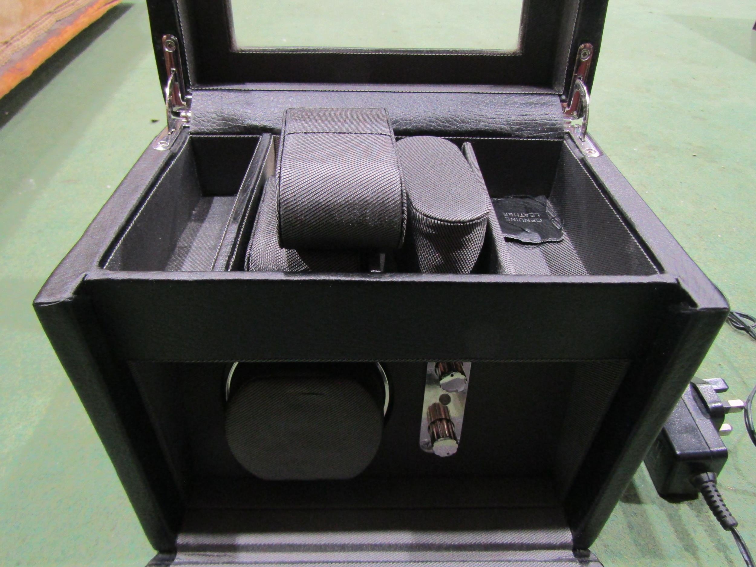 A Dulwich design genuine leather multiple watch case with automatic ...