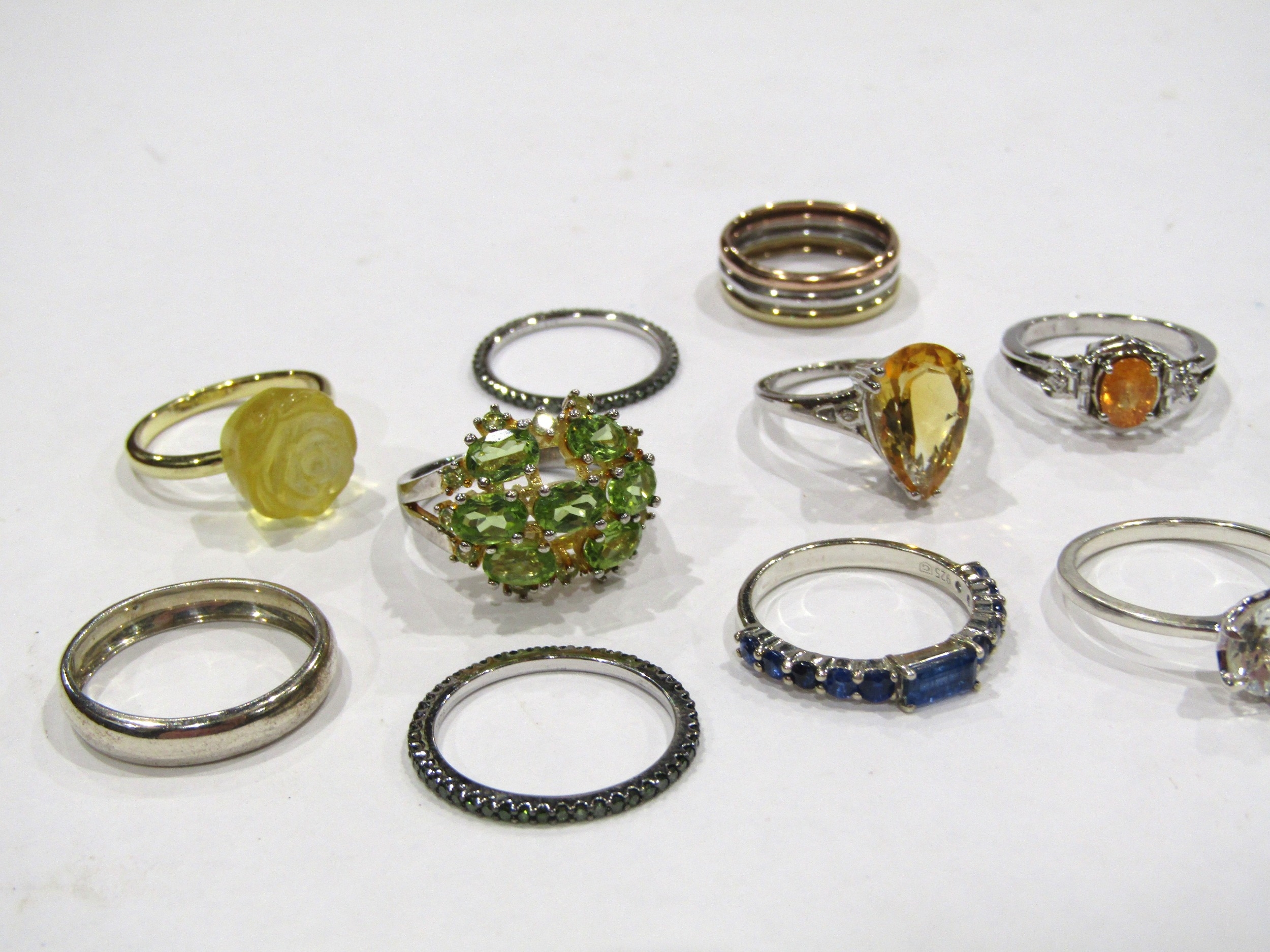 Twelve dress rings including silver examples