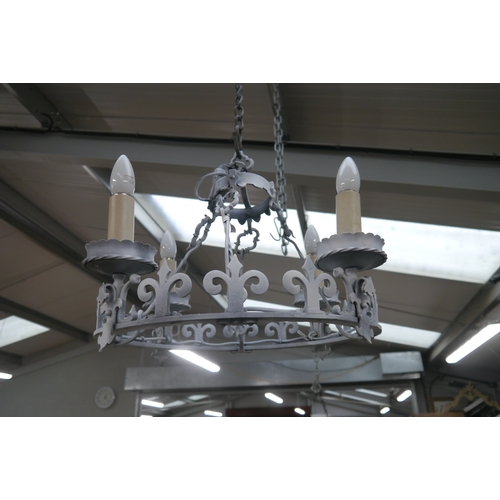 2014 - A blacksmith-made iron work electrolier, painted in white