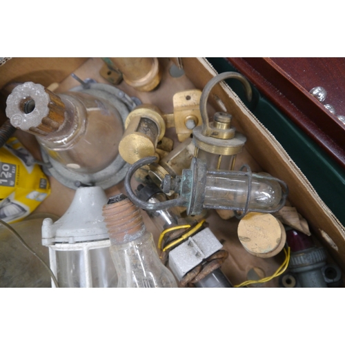 2028 - A box of lighting including hurricane lights, nautical lamps and a Mazda light