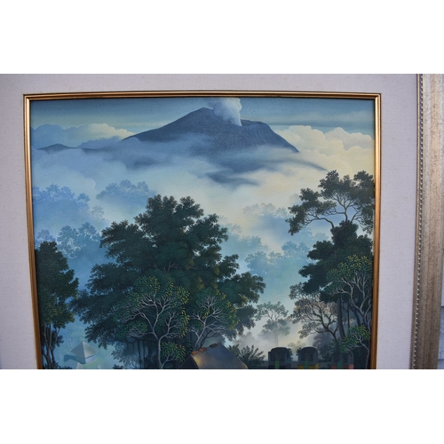 5037 - WUDNATA 2005 Contemporary making offerings to the gods, Bali temple in jungle with volcano to backgr... 