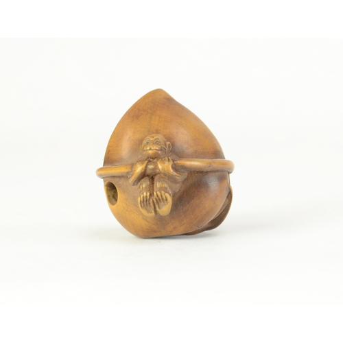 9054 - A wood netsuke of a monkey carrying a large peach (signed)

3cm high, 3cm deep and 3.2cm wide

Prove... 