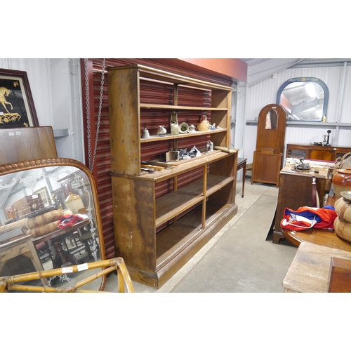 A large mid century oak display unit, H200cm W245cm