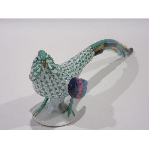 1252 - A Herend hand painted porcelain figurine of a green fishnet pheasant, model 5025, approximately 22cm... 