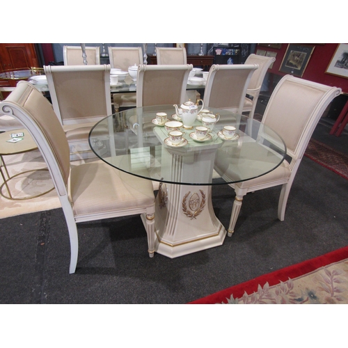 1087 - A French reproduction breakfast table, cream and gilt base with ribbon and swag design, circular gla... 