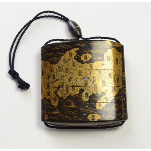 9009 - A gold lacquer five case inro depicting a map of Japan

6.8cm high, 6.8cm wide

Provenance
Henry Pot... 