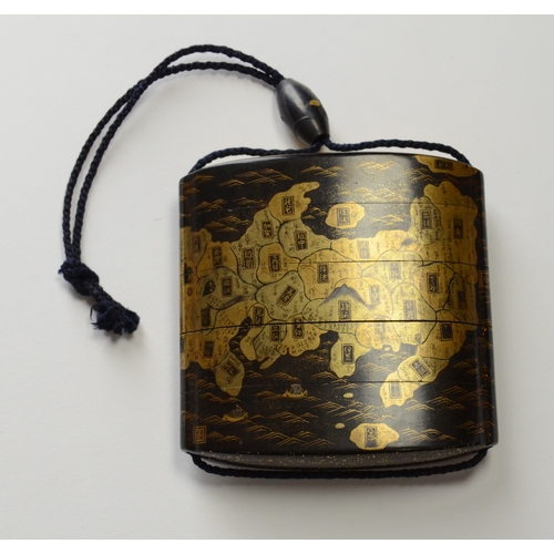 9009 - A gold lacquer five case inro depicting a map of Japan

6.8cm high, 6.8cm wide

Provenance
Henry Pot... 
