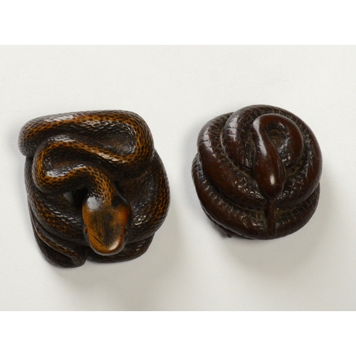 9058 - Two wooden snake netsukes, one signed

4cm wide, 4.4cm deep and 2.9cm high (largest example)

Doroth... 