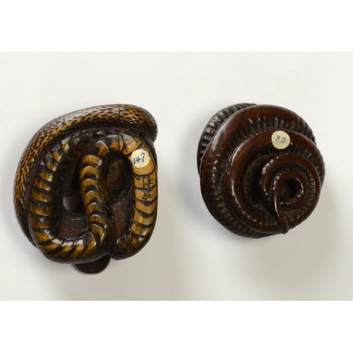 9058 - Two wooden snake netsukes, one signed

4cm wide, 4.4cm deep and 2.9cm high (largest example)

Doroth... 