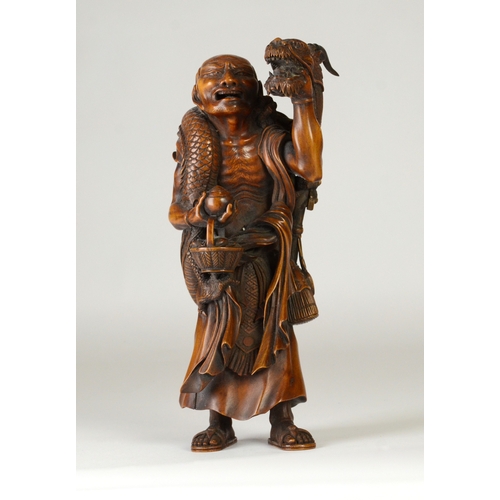 9001 - A large Japanese wooden okimono figure of Handaka Sonja with dragon coiled around his body and over ... 