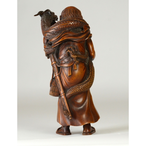 9001 - A large Japanese wooden okimono figure of Handaka Sonja with dragon coiled around his body and over ... 