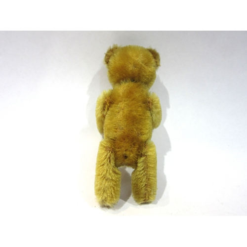 8053 - An early 20th Century Schuco golden mohair jointed Teddy Bear scent bottle, head removing to reveal ... 