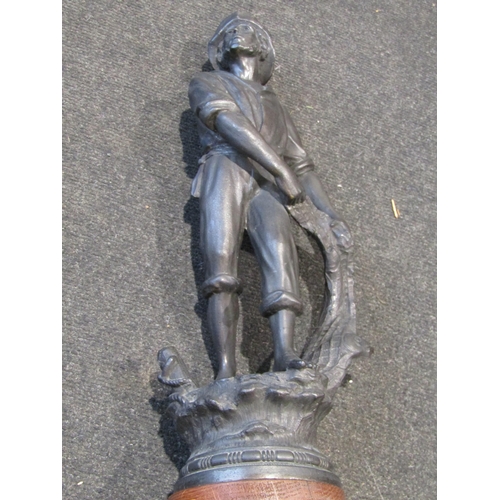1010 - A pair of spelter figures of fisherman and woman on wood pedestals, approximately 54cm tall