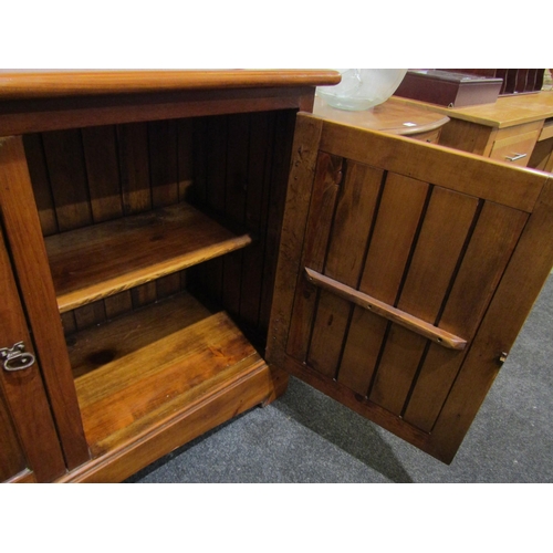 1030 - A Victorian style pine two door school cupboard on plinth base, 90cm tall x 120cm wide x 45cm deep