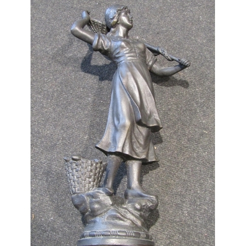1010 - A pair of spelter figures of fisherman and woman on wood pedestals, approximately 54cm tall