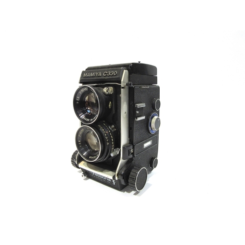 7057 - Mamiya C330 Professional F TLR film camera, serial 0135311, two Mamiya-Sekor 80mm f/2.8 lenses, with... 