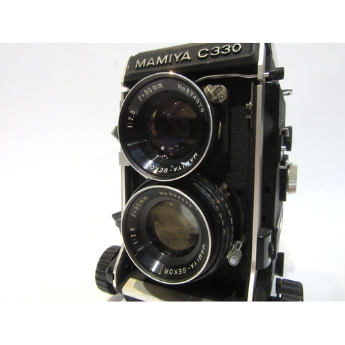 7057 - Mamiya C330 Professional F TLR film camera, serial 0135311, two Mamiya-Sekor 80mm f/2.8 lenses, with... 
