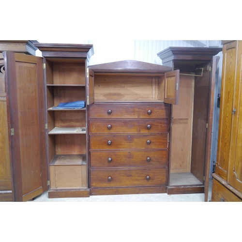 A Victorian mahogany compactum wardrobe, central two door cabinet over ...