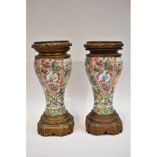 1001 - A pair of early-mid 19th Century Chinese canton vases with ornate ormolu tops and bases. The ceramic... 