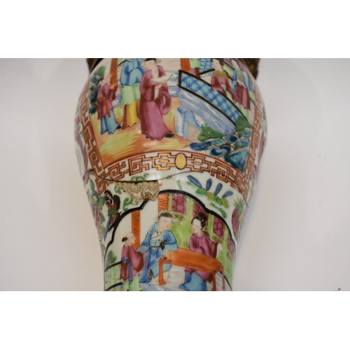 1001 - A pair of early-mid 19th Century Chinese canton vases with ornate ormolu tops and bases. The ceramic... 