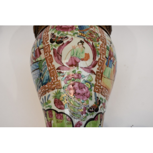 1001 - A pair of early-mid 19th Century Chinese canton vases with ornate ormolu tops and bases. The ceramic... 