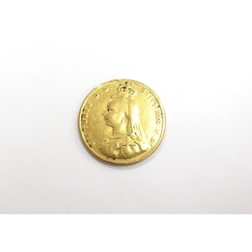 6540 - An 1887 gold sovereign, worn