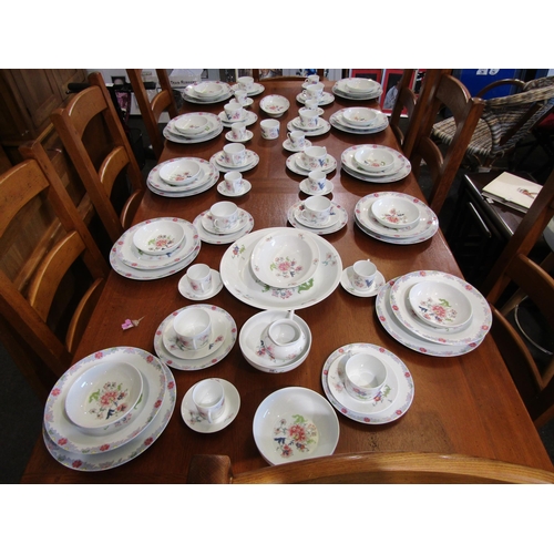 1061 - A large collection of Limoges tableware including ten dinner plates, cups and saucers, bowls etc.