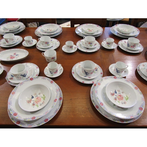 1061 - A large collection of Limoges tableware including ten dinner plates, cups and saucers, bowls etc.