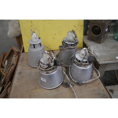 2010 - Four aluminium light shades with porcelain phillips fittings