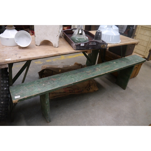2041 - A rustic green painted pine bench, 190cm long