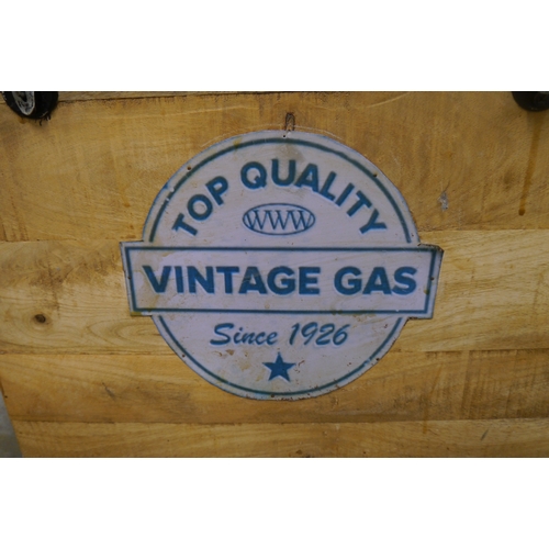 2061 - A wooden box with a 'Vintage Gas' sticker
