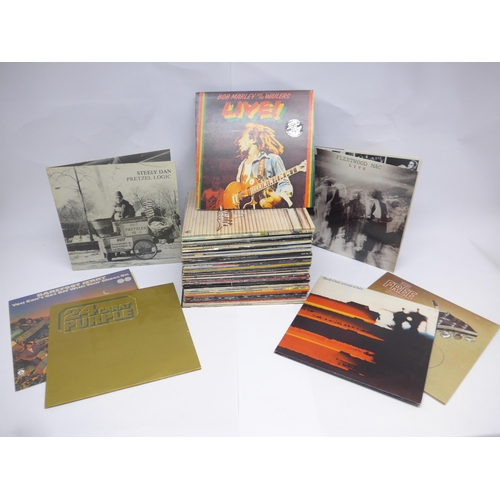 8223 - A varied collection of approximately sixty LPs, artists include Fleetwood Mac, Steely Dan, ELO, The ... 