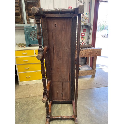 2003 - An oak hall seat with turned supports, 152cm long