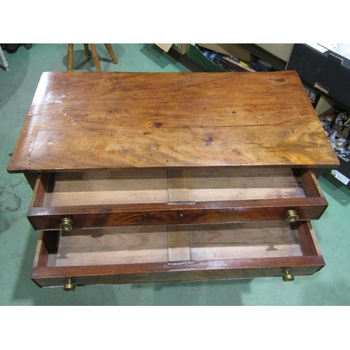 4001 - An early George III flame mahogany lowboy, the two drawers over square legs on brass barrel castors,... 