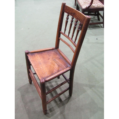 4057 - A set of three Georgian oak rustic chairs, spindle backs to stretcher bases
