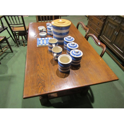 4059 - An oak dining table with turned legs to H-stretcher base, 74cm tall x 153cm long x 84cm wide