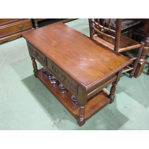 4060 - A 20th Century oak two-tier coffee table/television stand with two drawers, 51cm tall x 91cm wide x ... 
