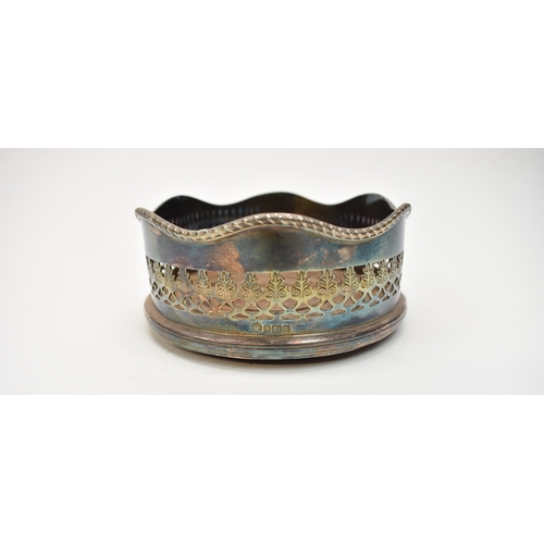 8057 - A Francis Howard Ltd silver win coaster with turned wooden base, Sheffield 1948, 9.7cm diameter, 122... 