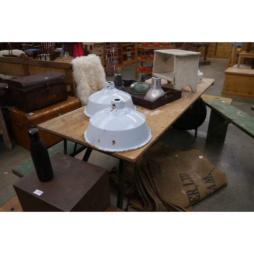 2035 - An Ex-military folding pine topped table, 180cm long