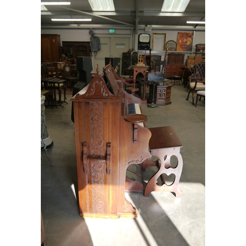 2001 - A 19th Century walnut Heins and Co church pump organ with stool