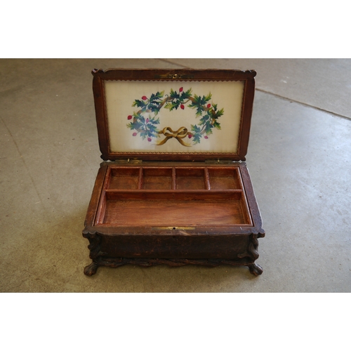2007 - A late 19th Century Black Forest mahogany and leather jewellery box