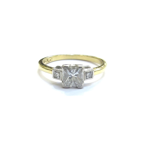 6035 - An 18ct gold platinum set Princess cut diamond solitaire ring, with four corner claws and a smaller ... 