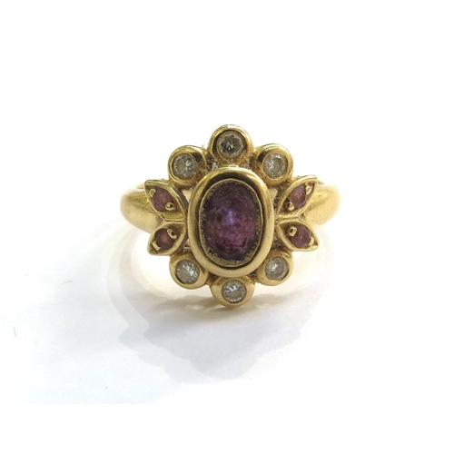 6153 - An 18ct gold amethyst and diamond ring. Size M, 5.1g