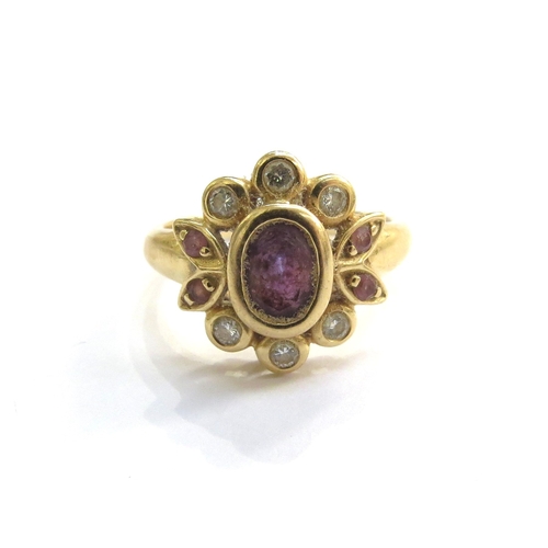 6153 - An 18ct gold amethyst and diamond ring. Size M, 5.1g