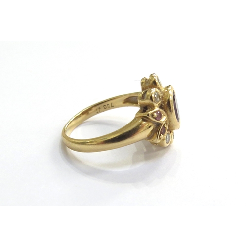 6153 - An 18ct gold amethyst and diamond ring. Size M, 5.1g