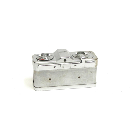 7020A - A mid 20th Century Czech made Mikroma subminiature spy camera by Meopta, having a Mirar 20mm f/3.5 l... 